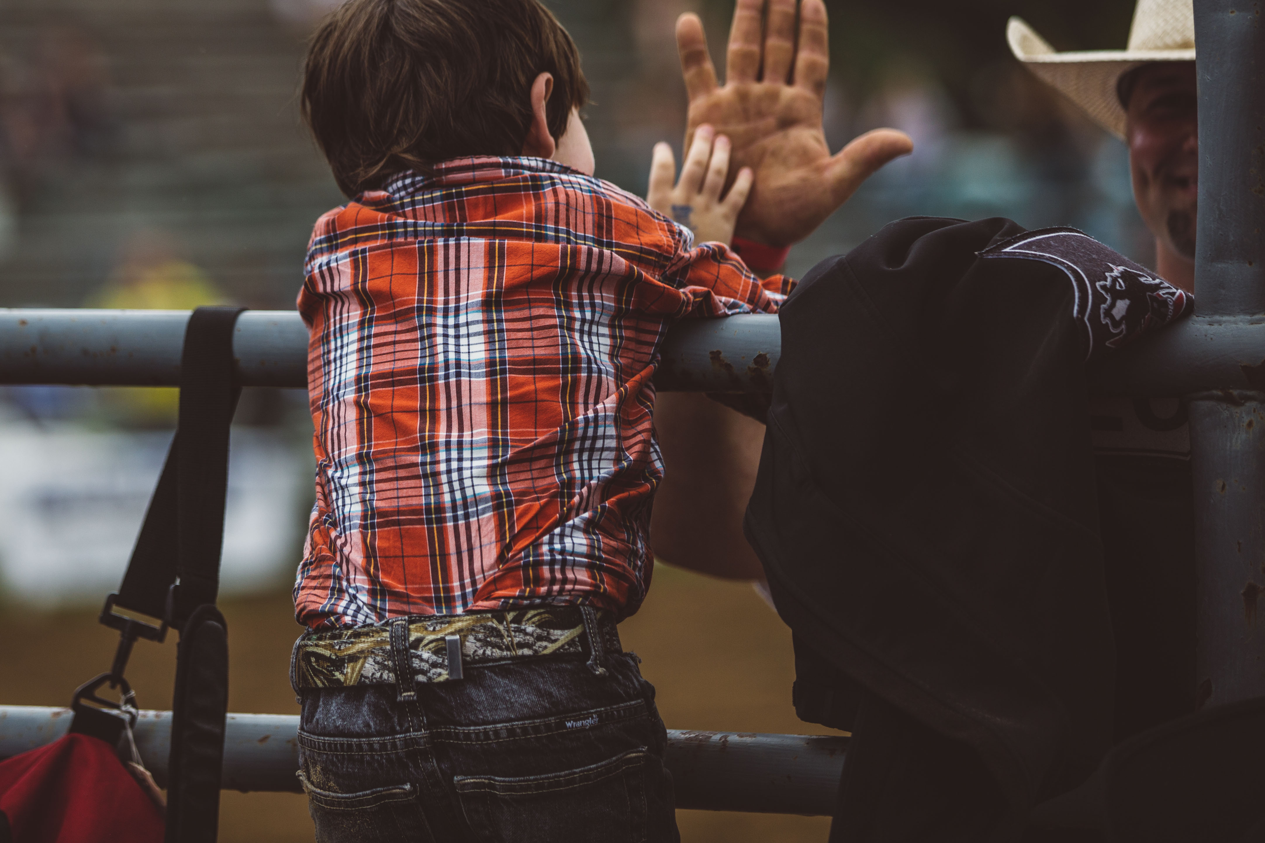 Kid gives high five