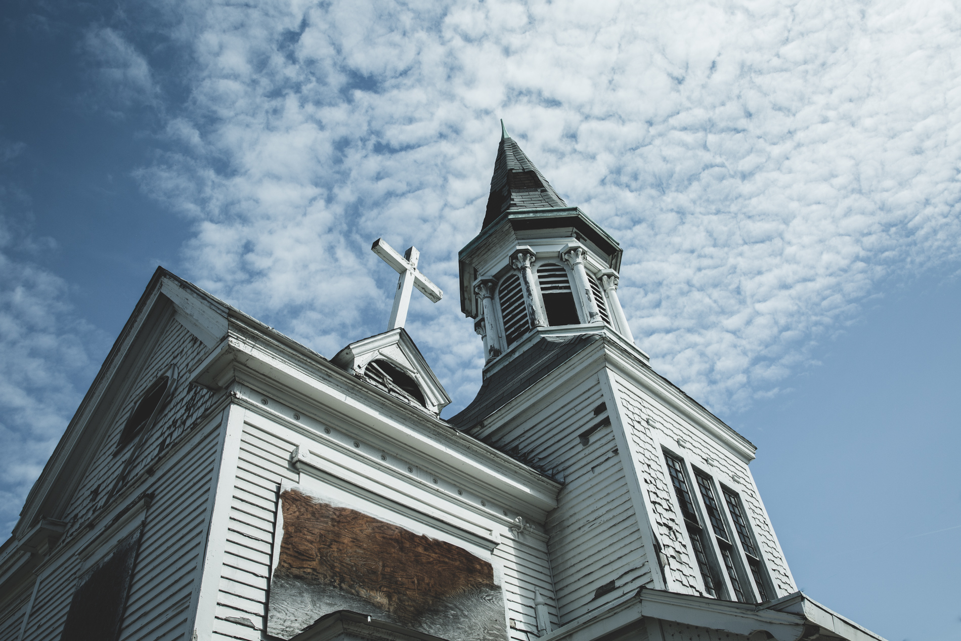 church falling apart cross focus