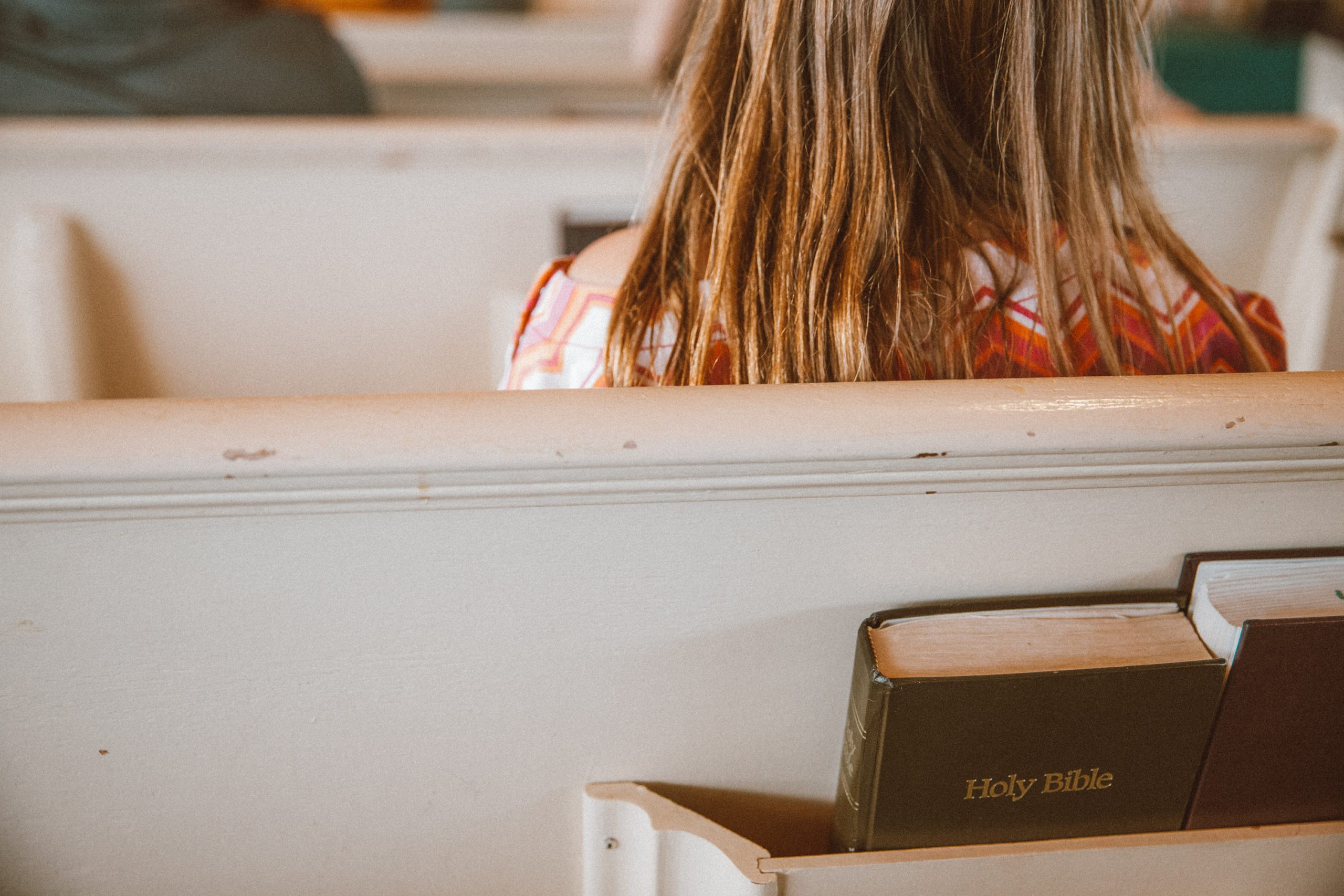 Girl sitting in church