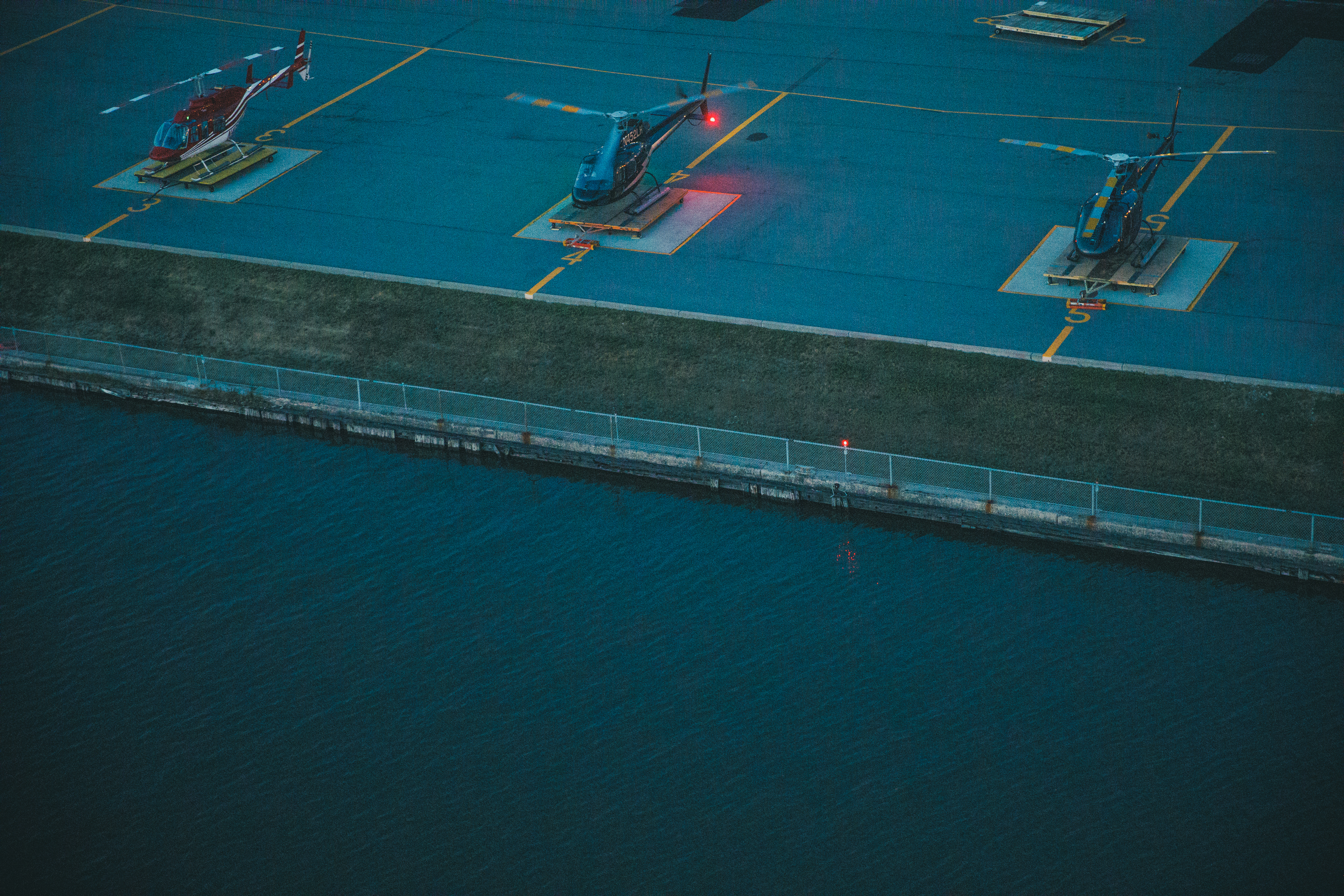 Helicopters on landing pad