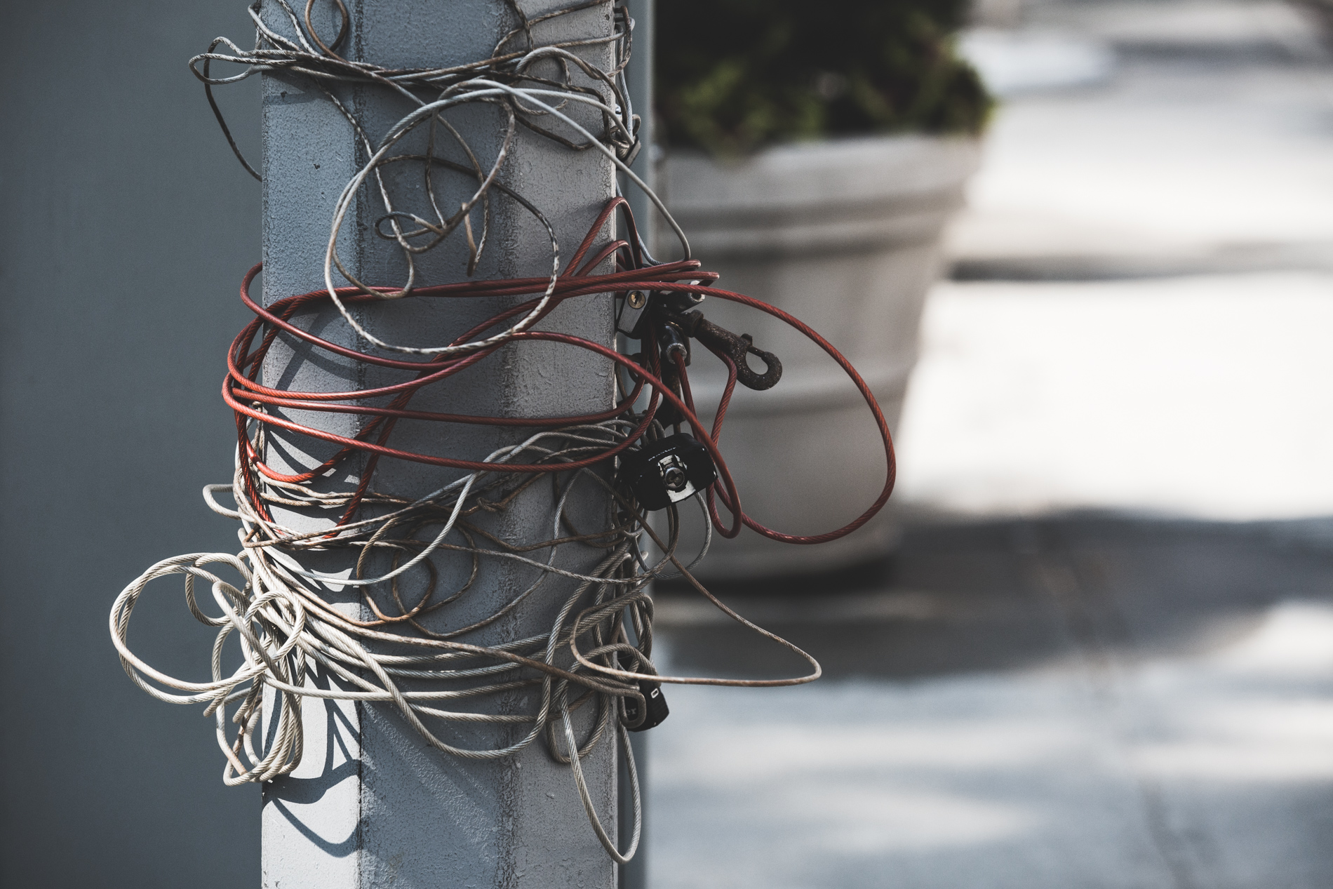 bike chains on a light pole