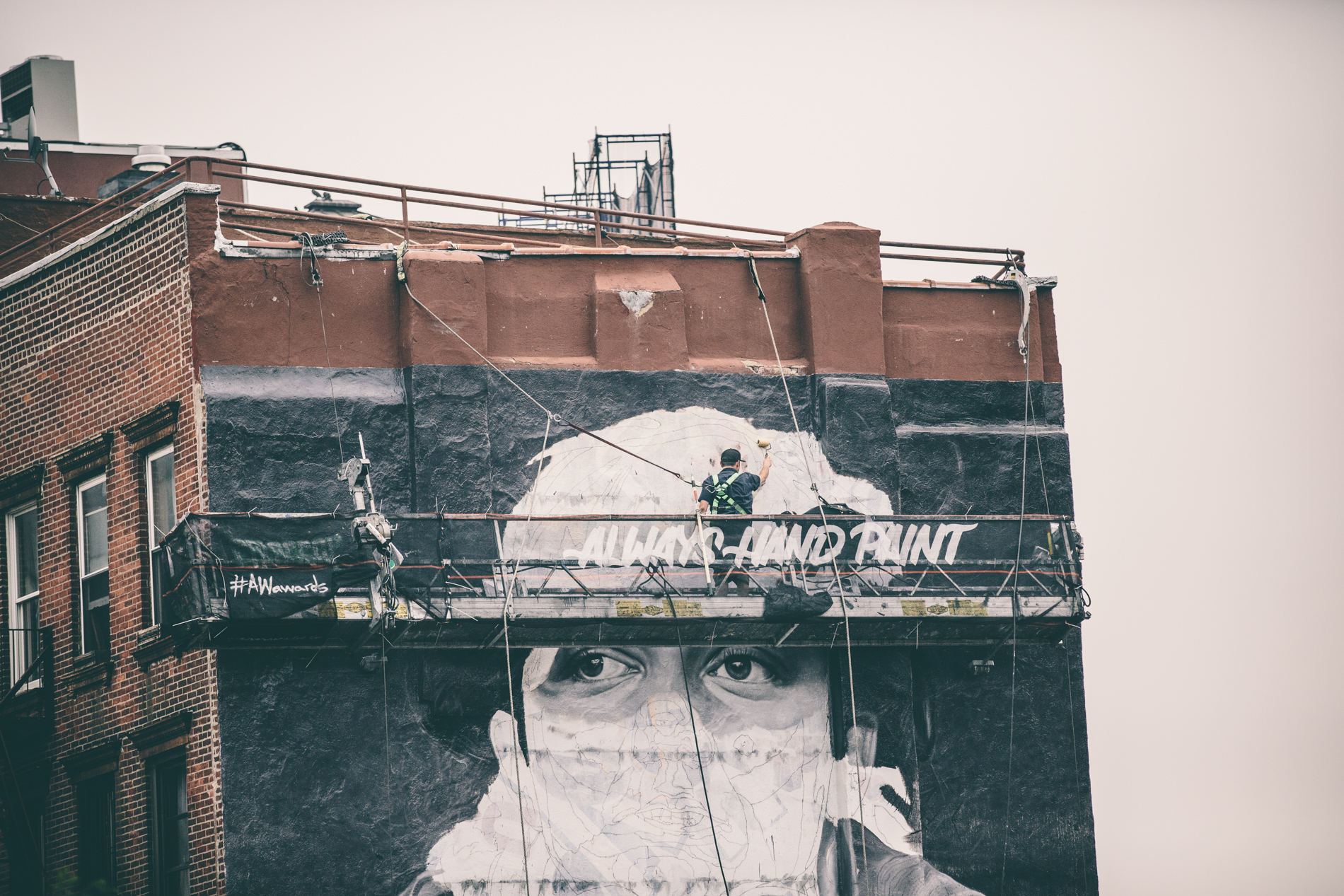brooklyn wall mural being painted