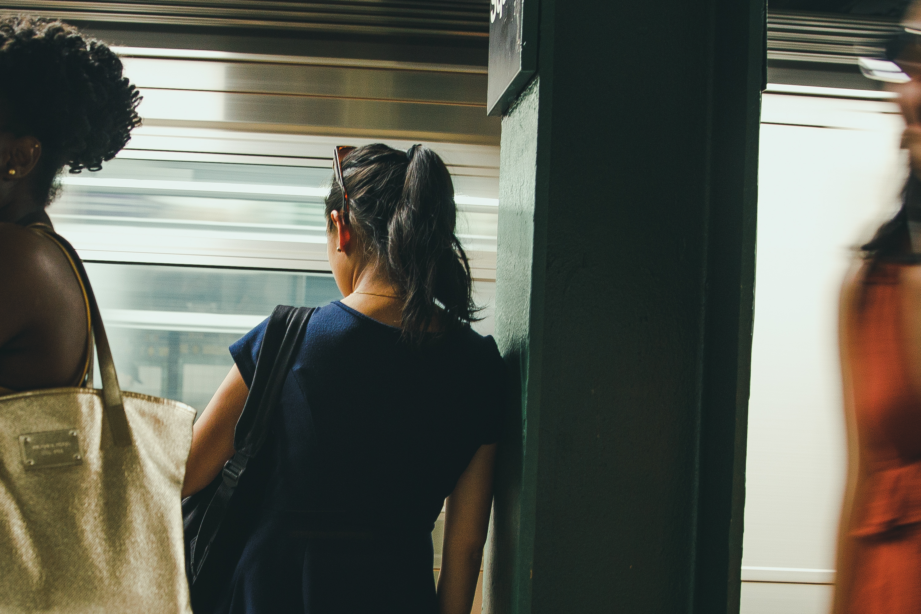 Lady waiting for subway