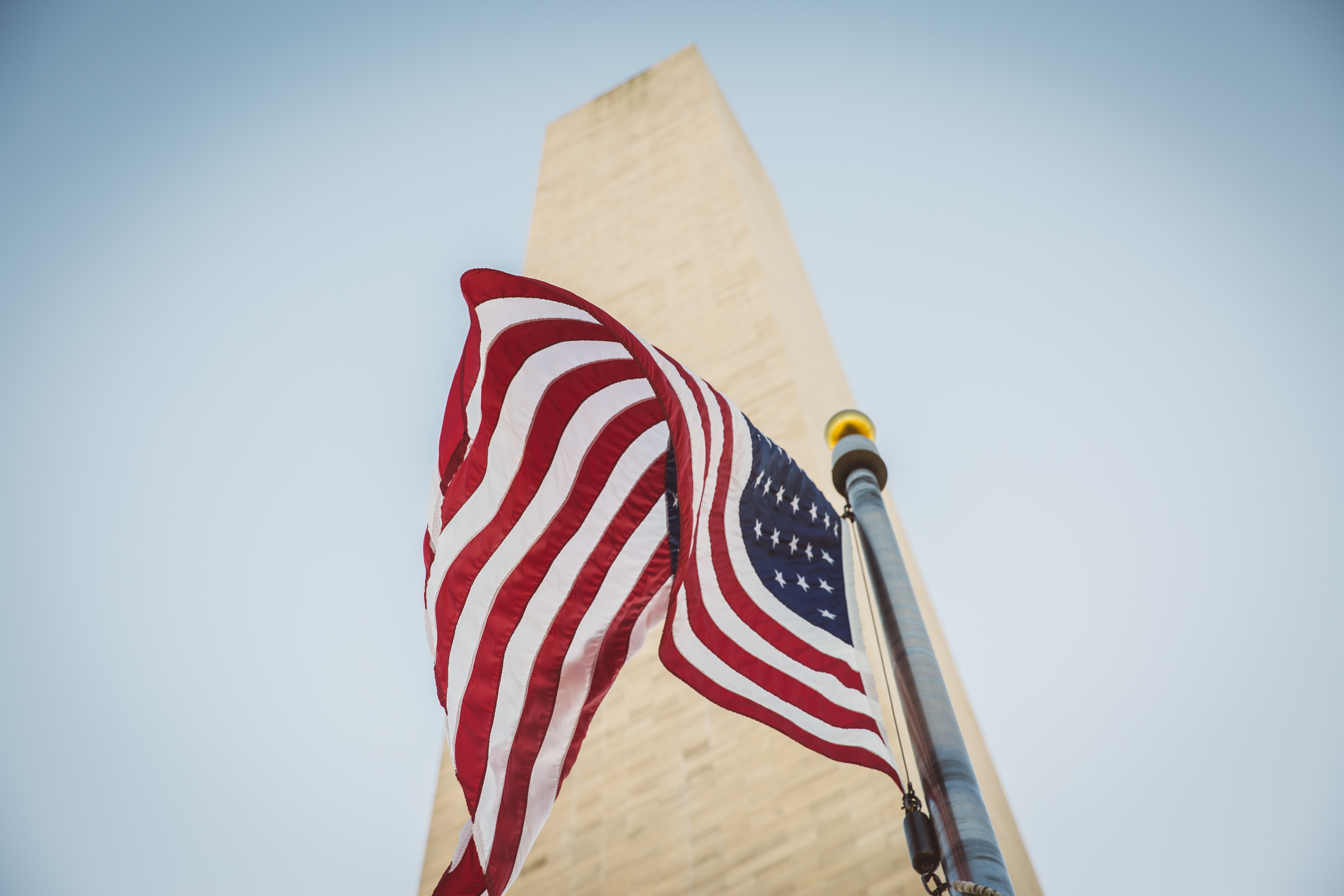 Flag waving by washington monument