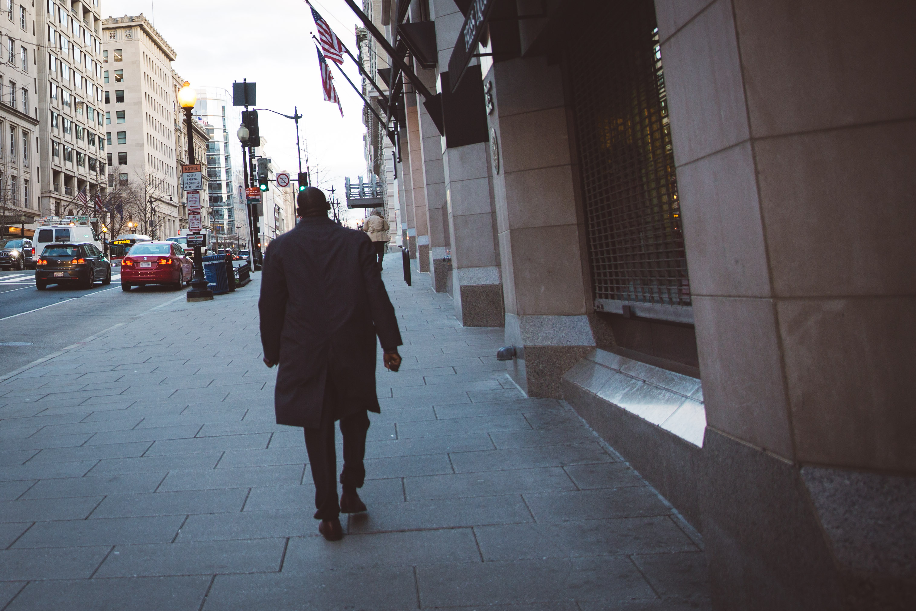 Man walking on sidewalk