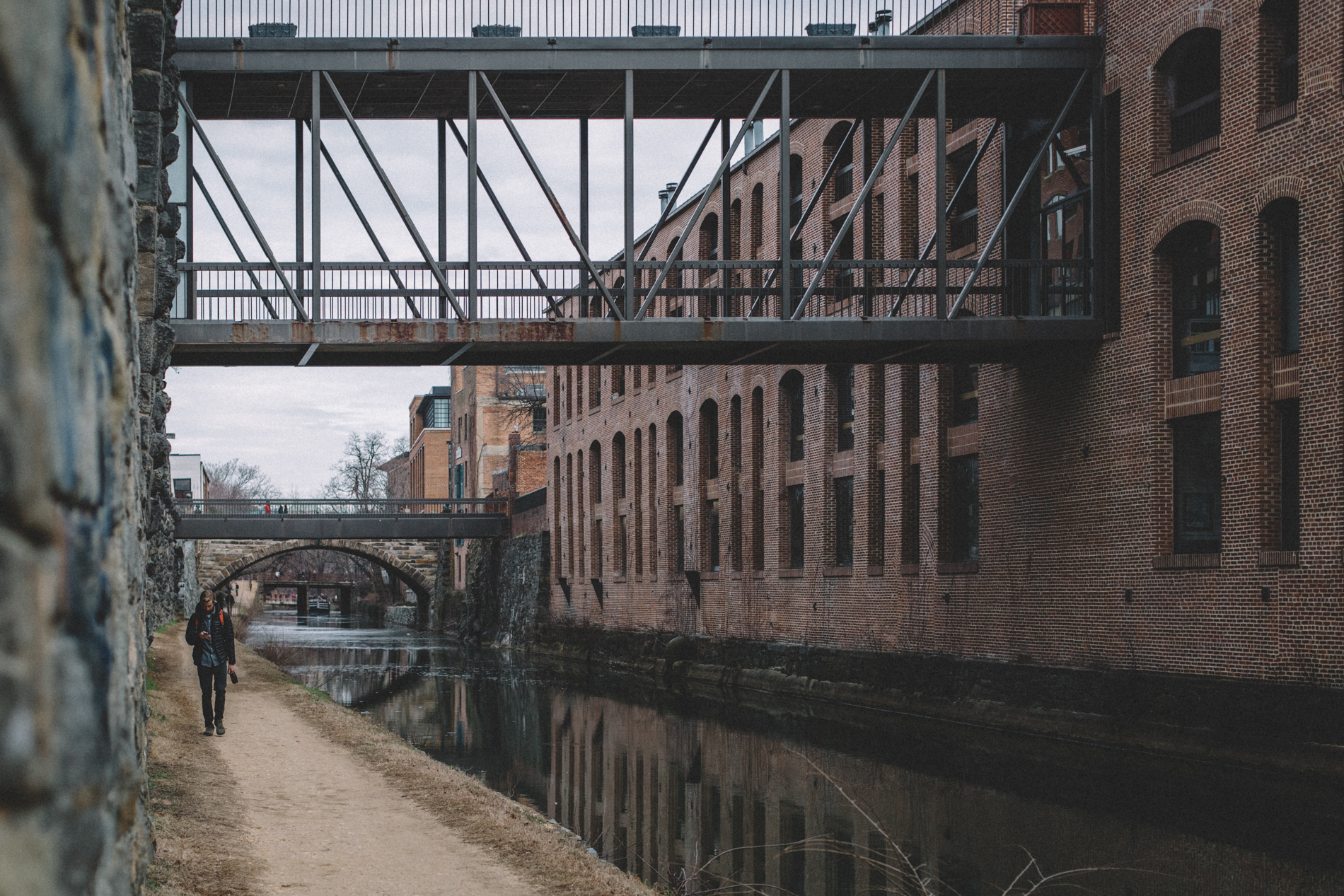 man walking down path in georgetown