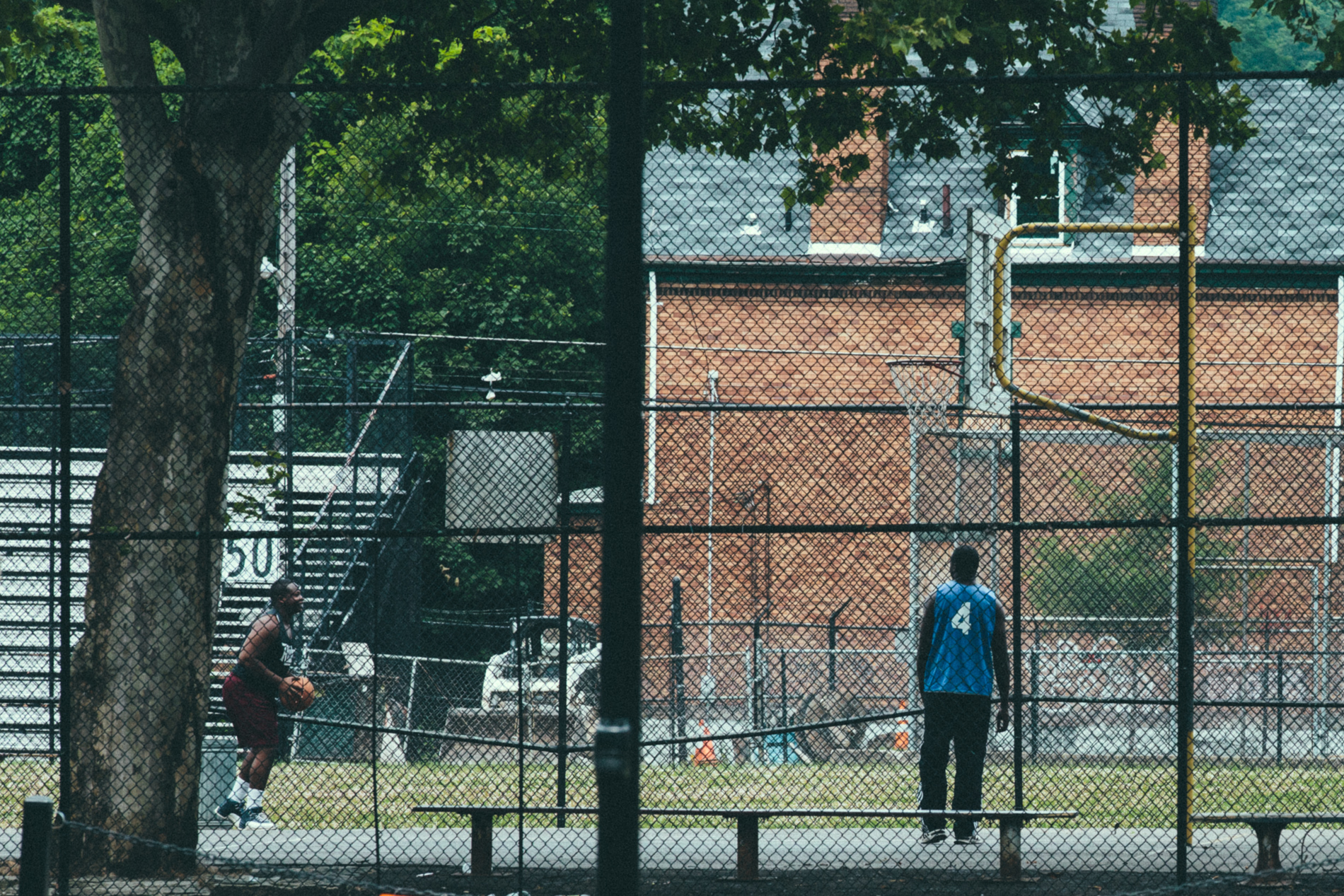 guy shooting basketball