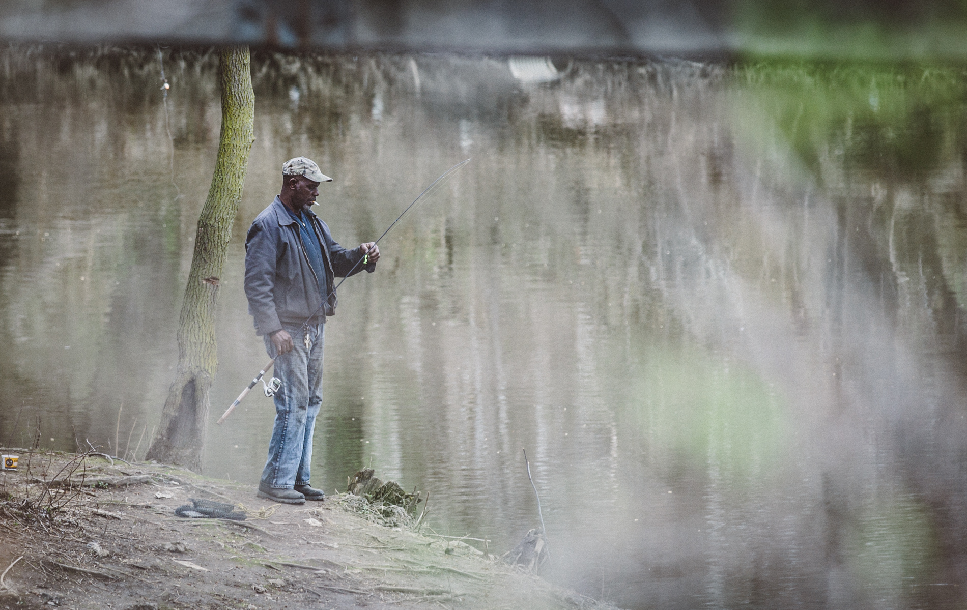 man fishing in river