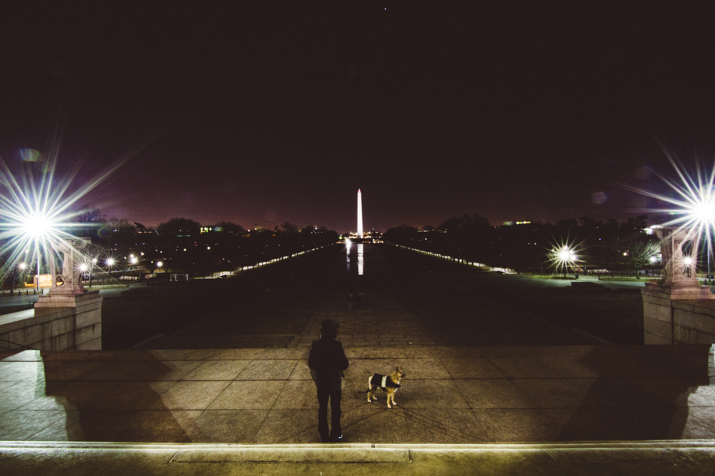Man and dog at Washington monument
