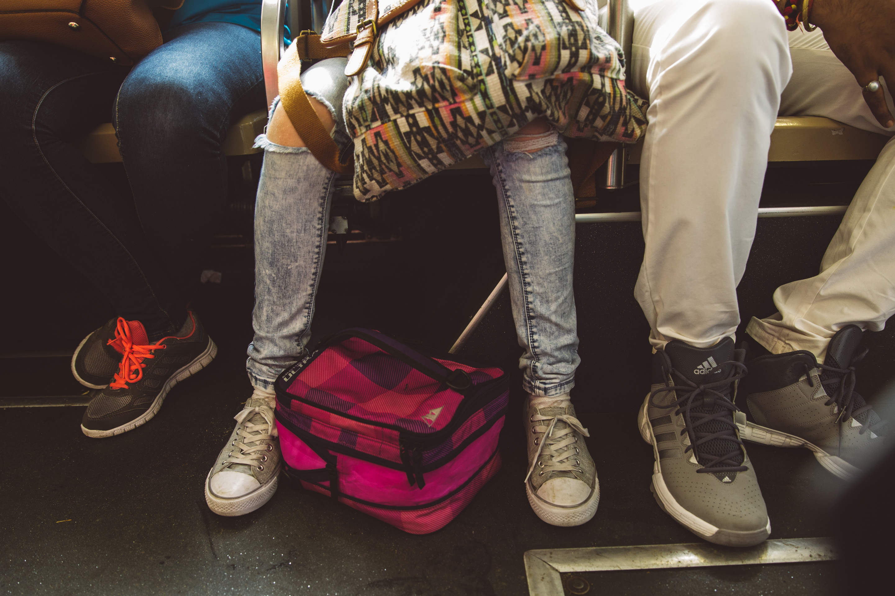 sitting on the bus with bag