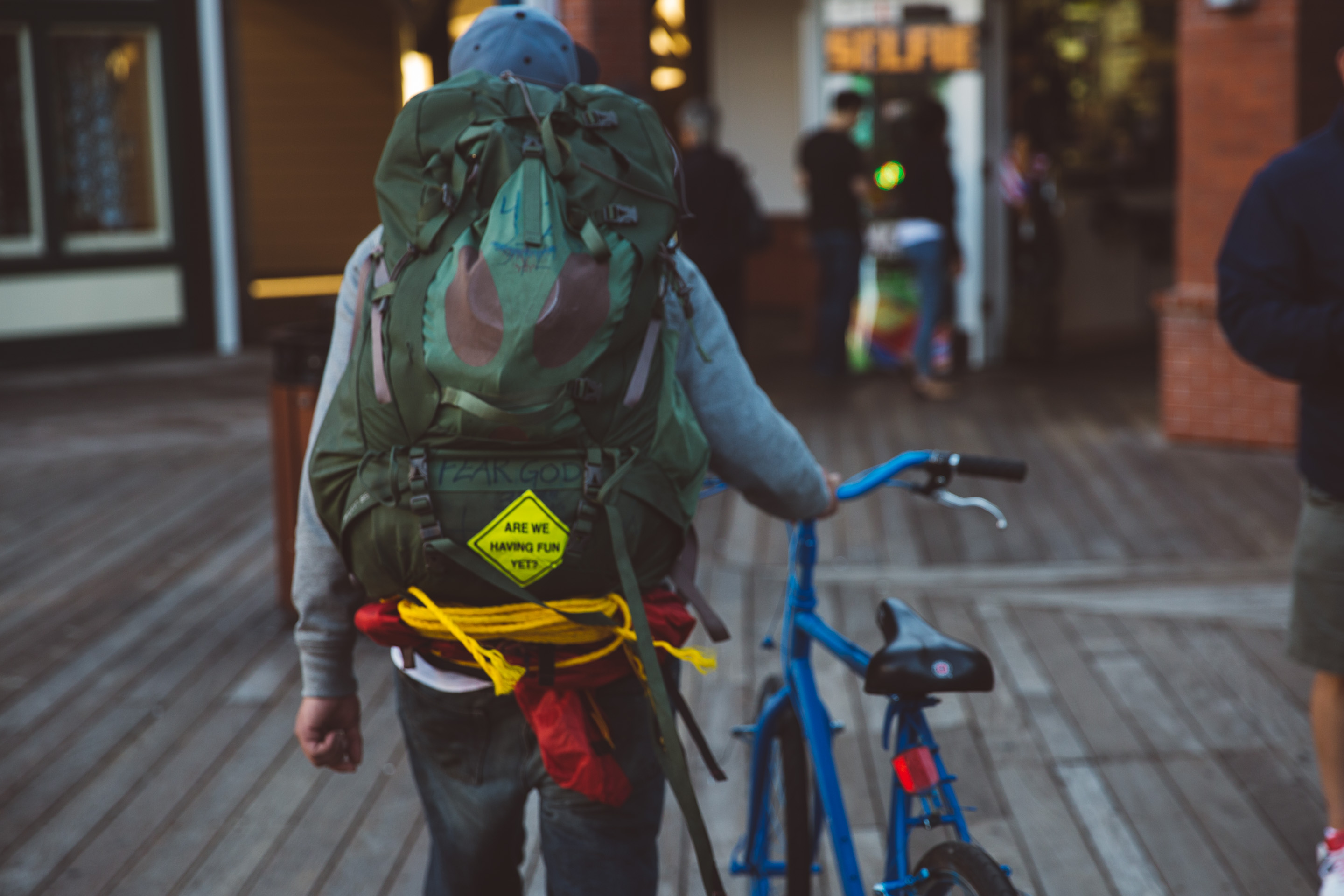 backpacker walking with bike