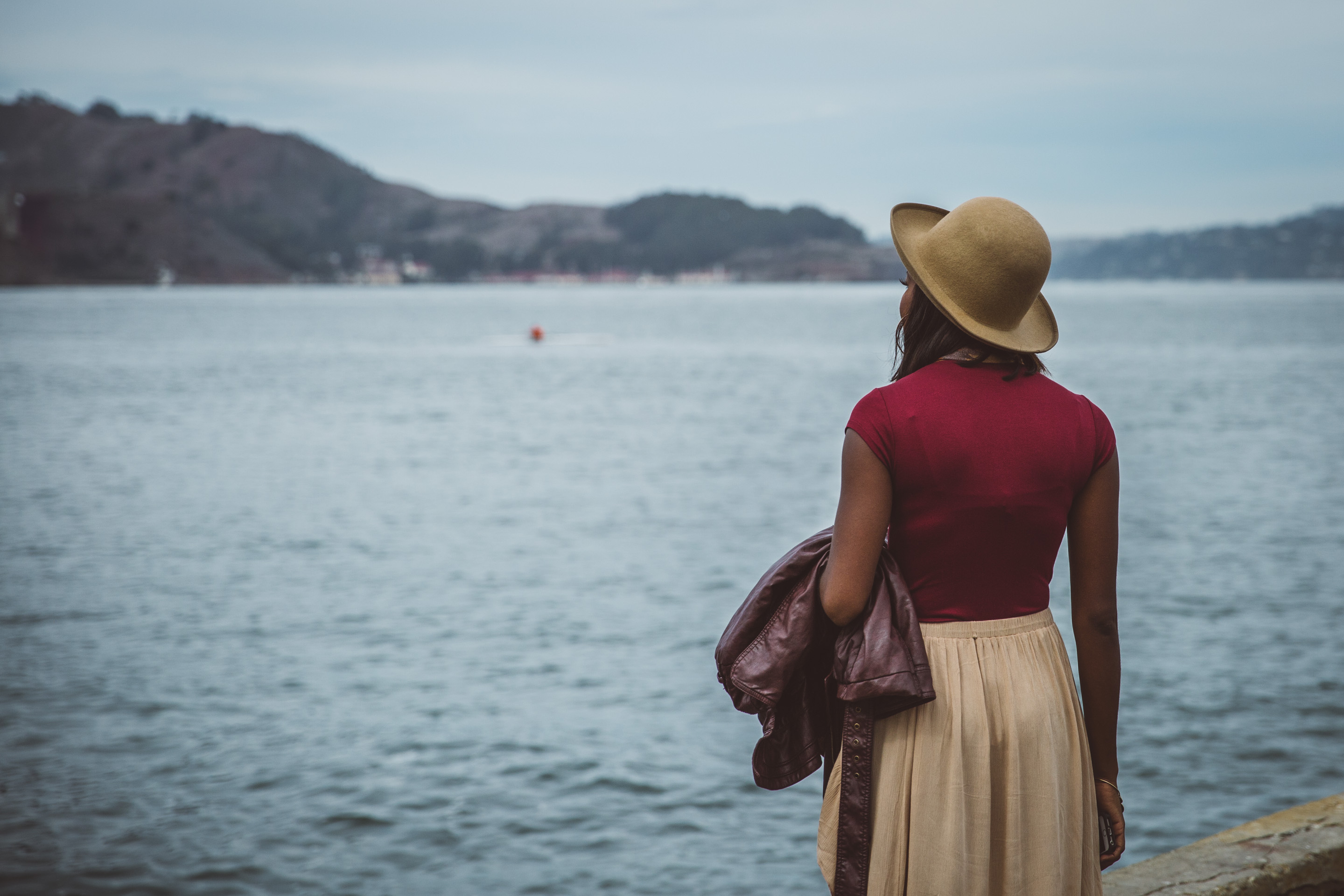 girl looking out over ocean