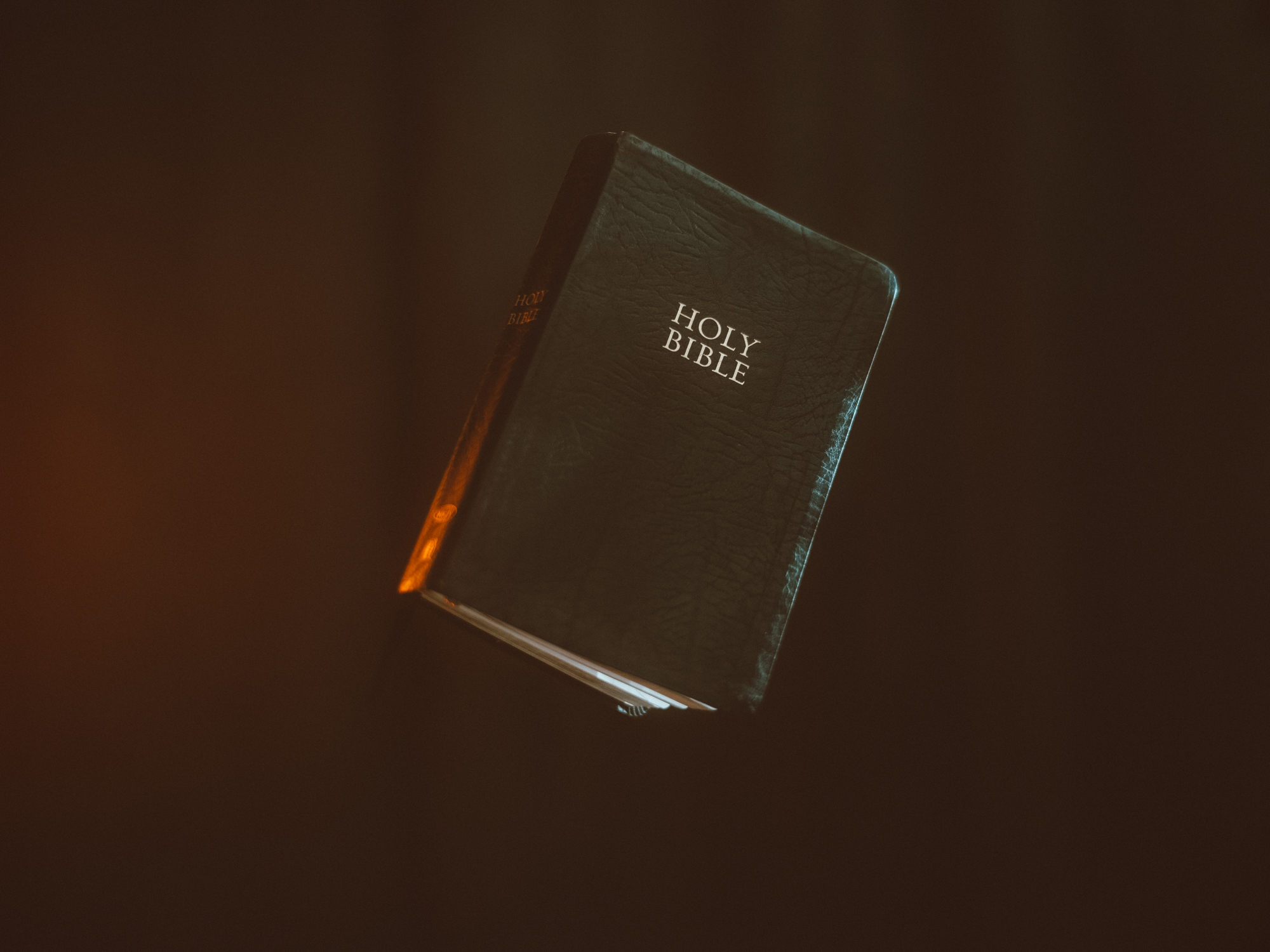 Bible in dark room