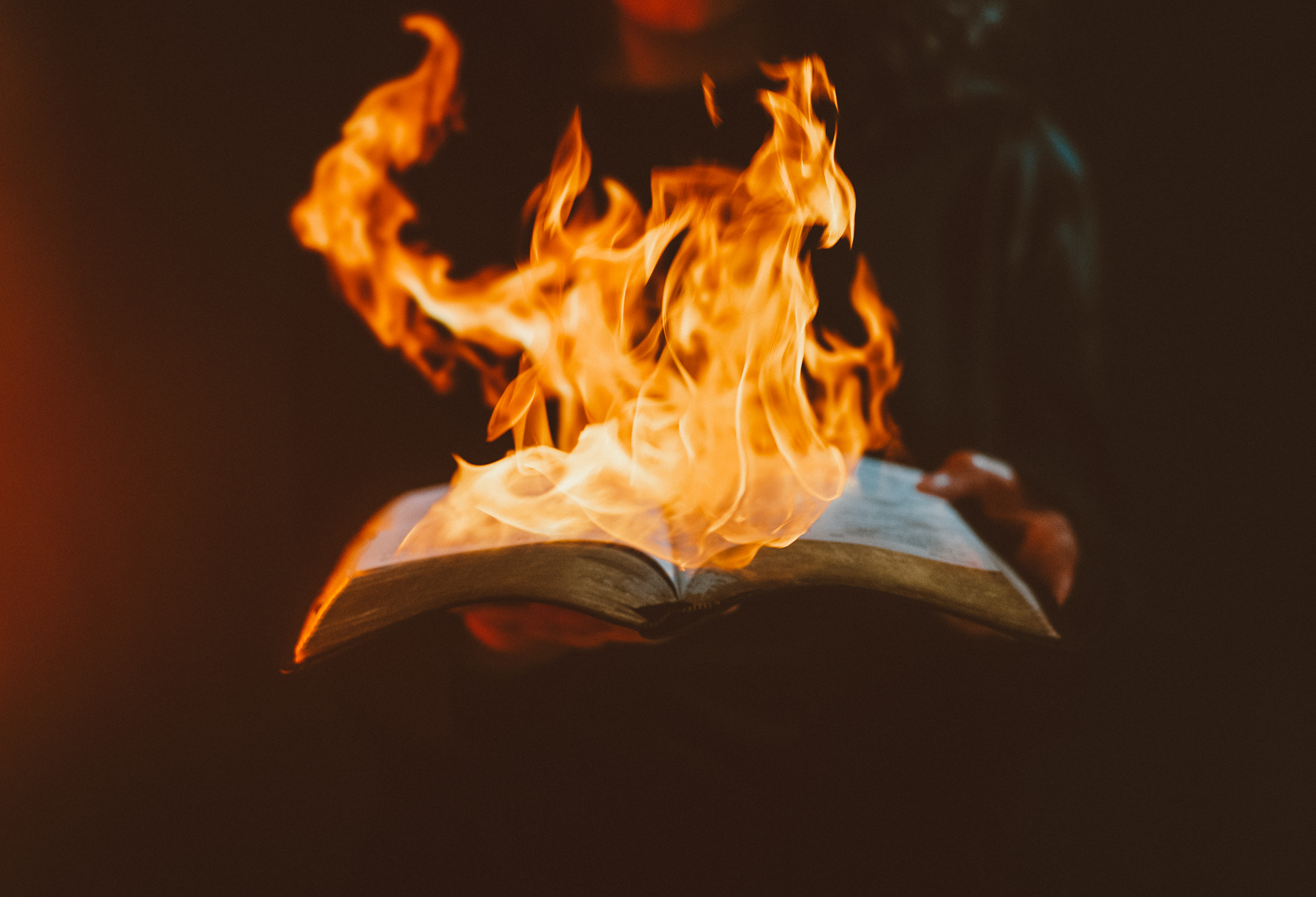 Flames on bible
