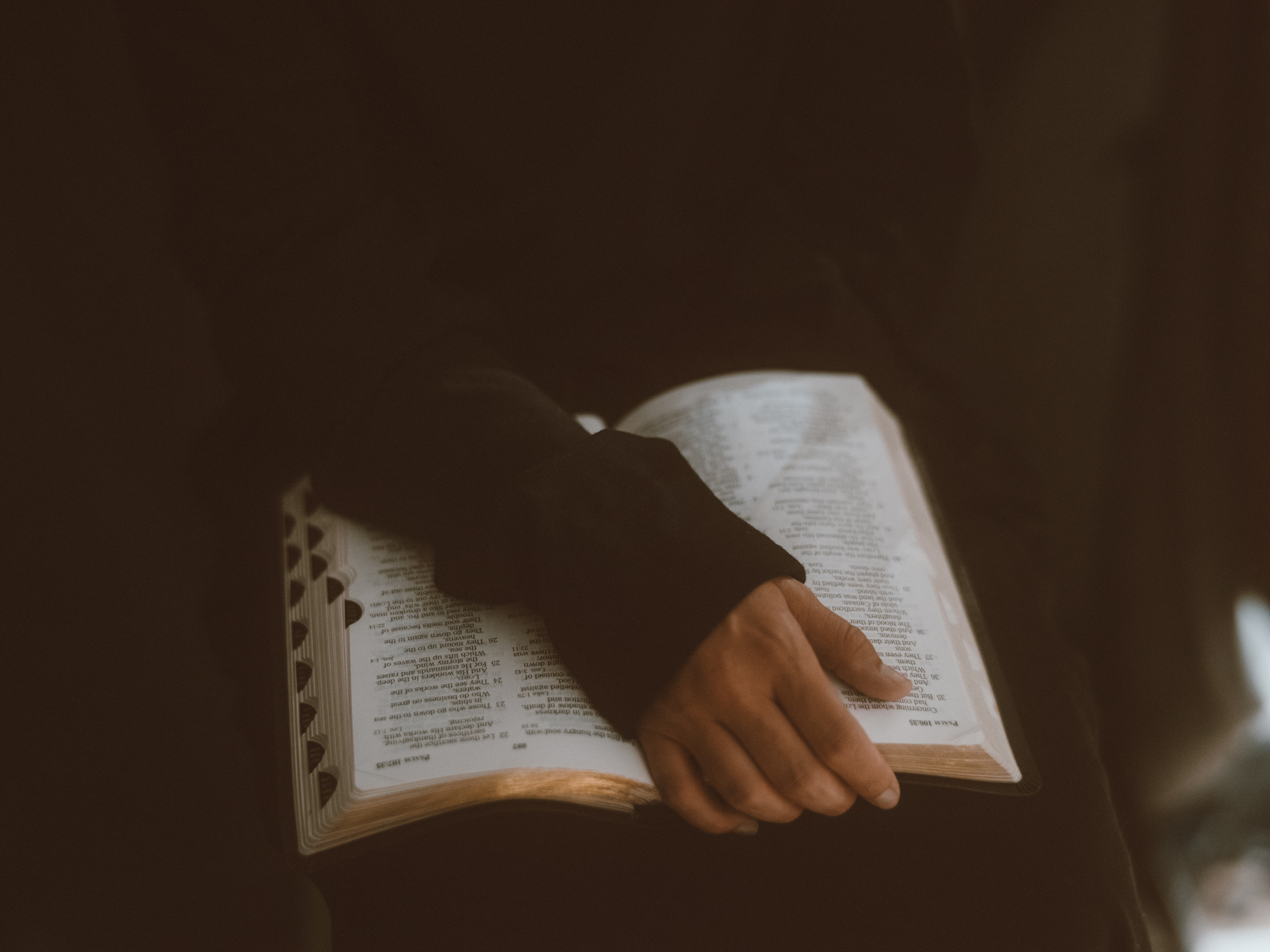 Holding the bible